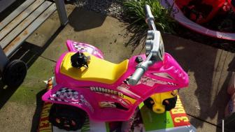 childs pink battery quad