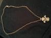 9k gold curb chain with solid 3 feathers pendant