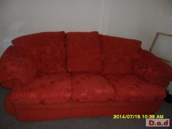 Red three seater sofa and matching chair