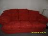 Red three seater sofa and matching chair